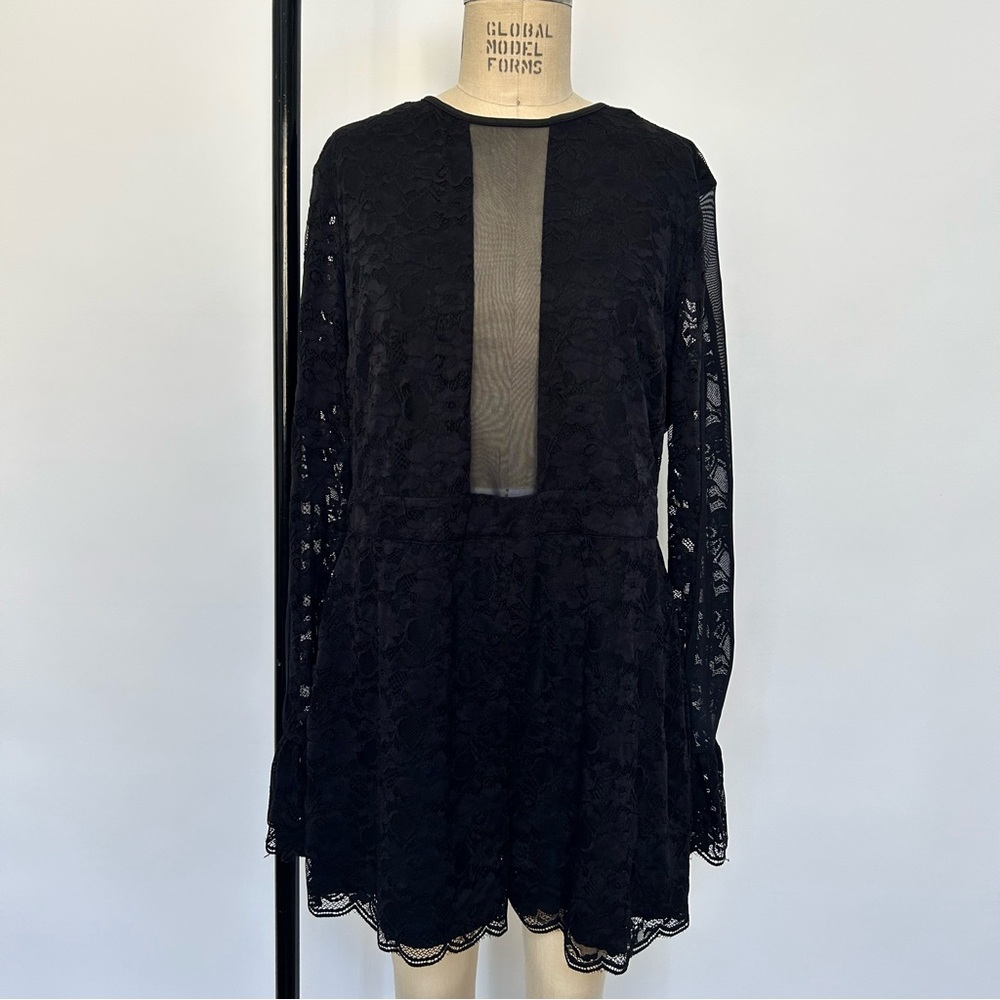 Bebe Jet Black Ruffle Bell Sleeve Romper